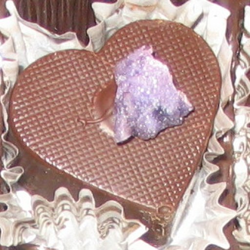 Lavender Creme heart with a garnished violet top