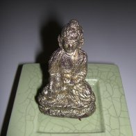 Gold-covered dark chocolate Buddha