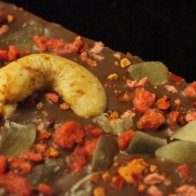 Ginger, Ground Chili, Volcano Cashews & Bacon Milk Chocolate Bar from Chocri