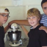 Kids making chocolate