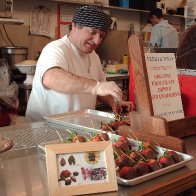 Peter dipping strawberries